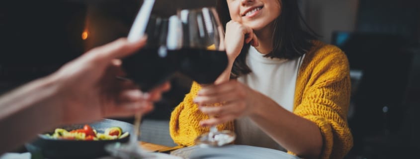 A couple enjoying a romantic meal at one of the best Traverse City Restaurants, Polaris