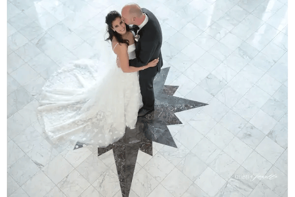 Wedding couple standing on the star at the Inn.