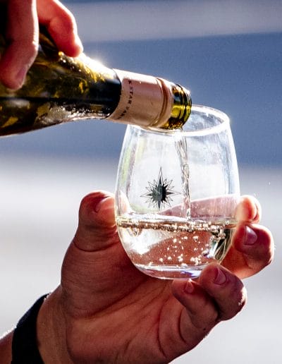 Bottle of wine with glass