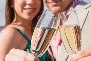 Packages & Specials 4 Couple toasting with sparkling wine