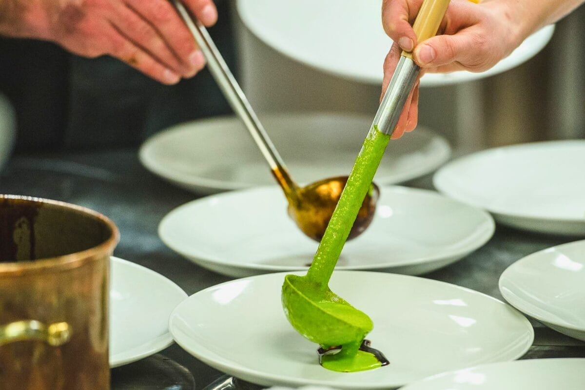 Foraged and Found: A Wild Food Dinner Experience 1 Putting ramp pesto on a plate