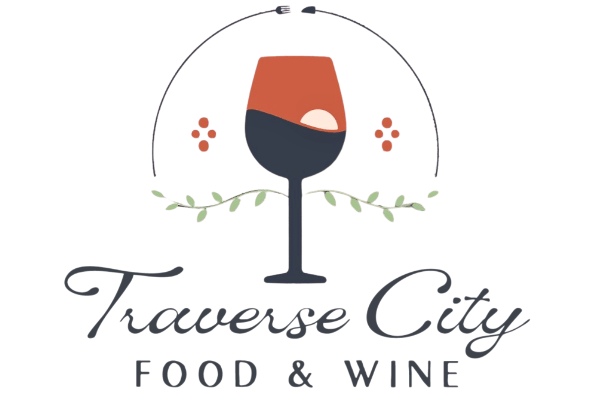 Traverse City Food and Wine Logo with a setting sun in a wine glass